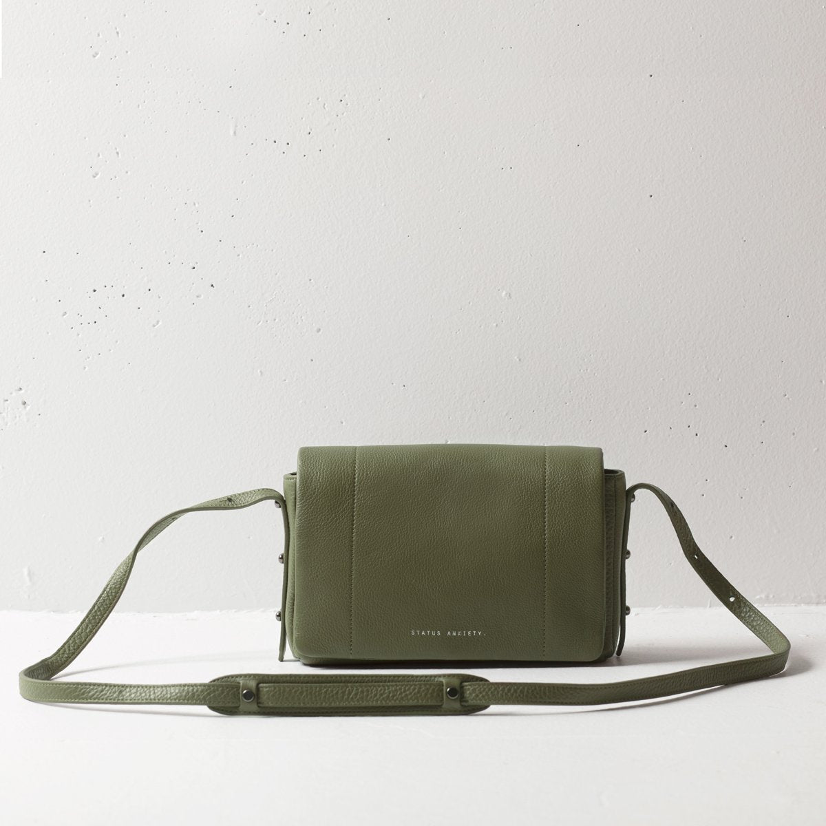 Succumb Leather Crossbody Bag in Khaki